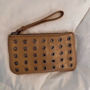 J. Crew leather and grommet wristlet